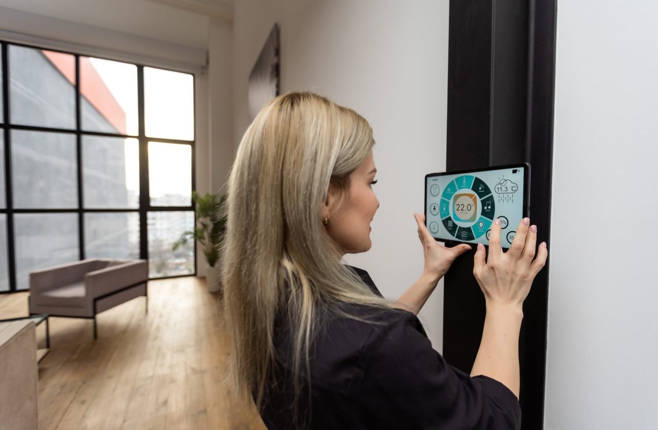 female-hands-holding-digital-tablet-with-smart-hom-2025-01-10-03-15-58-utc-scaled.jpg